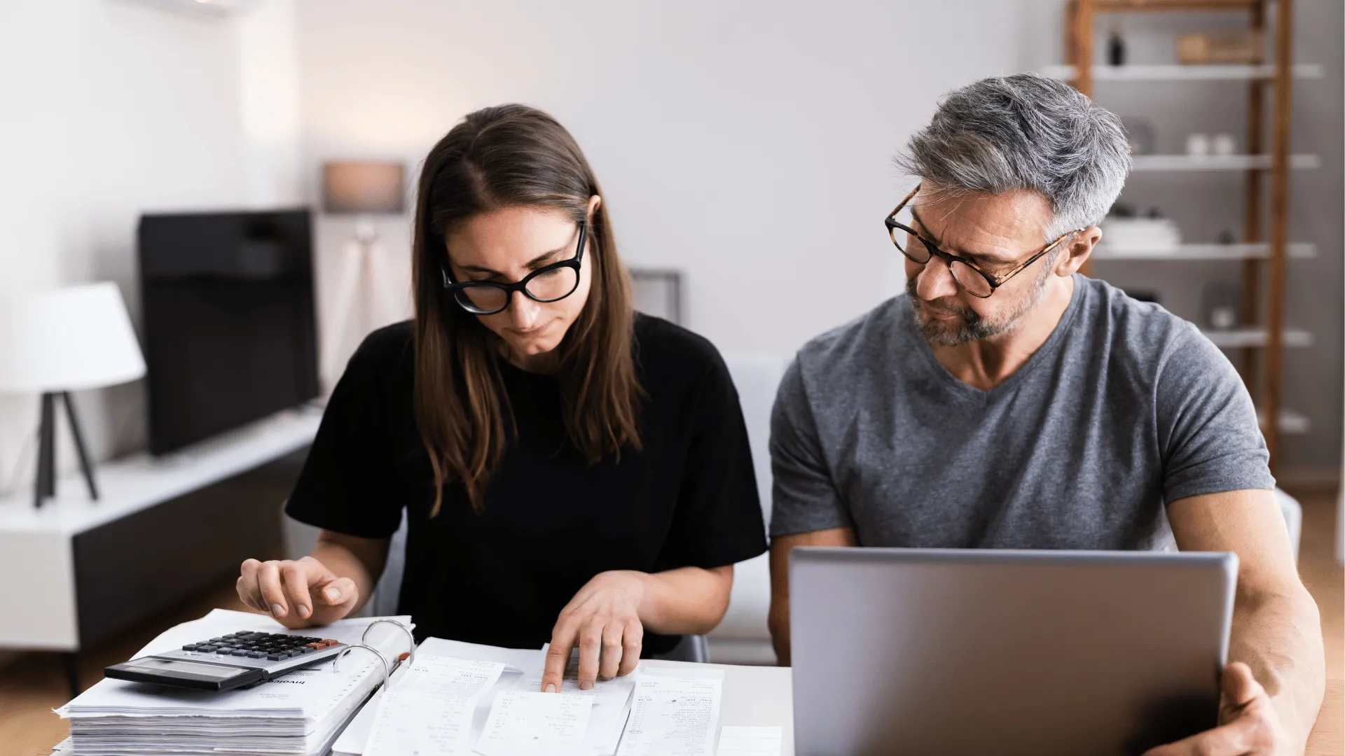 A man and woman at a computer